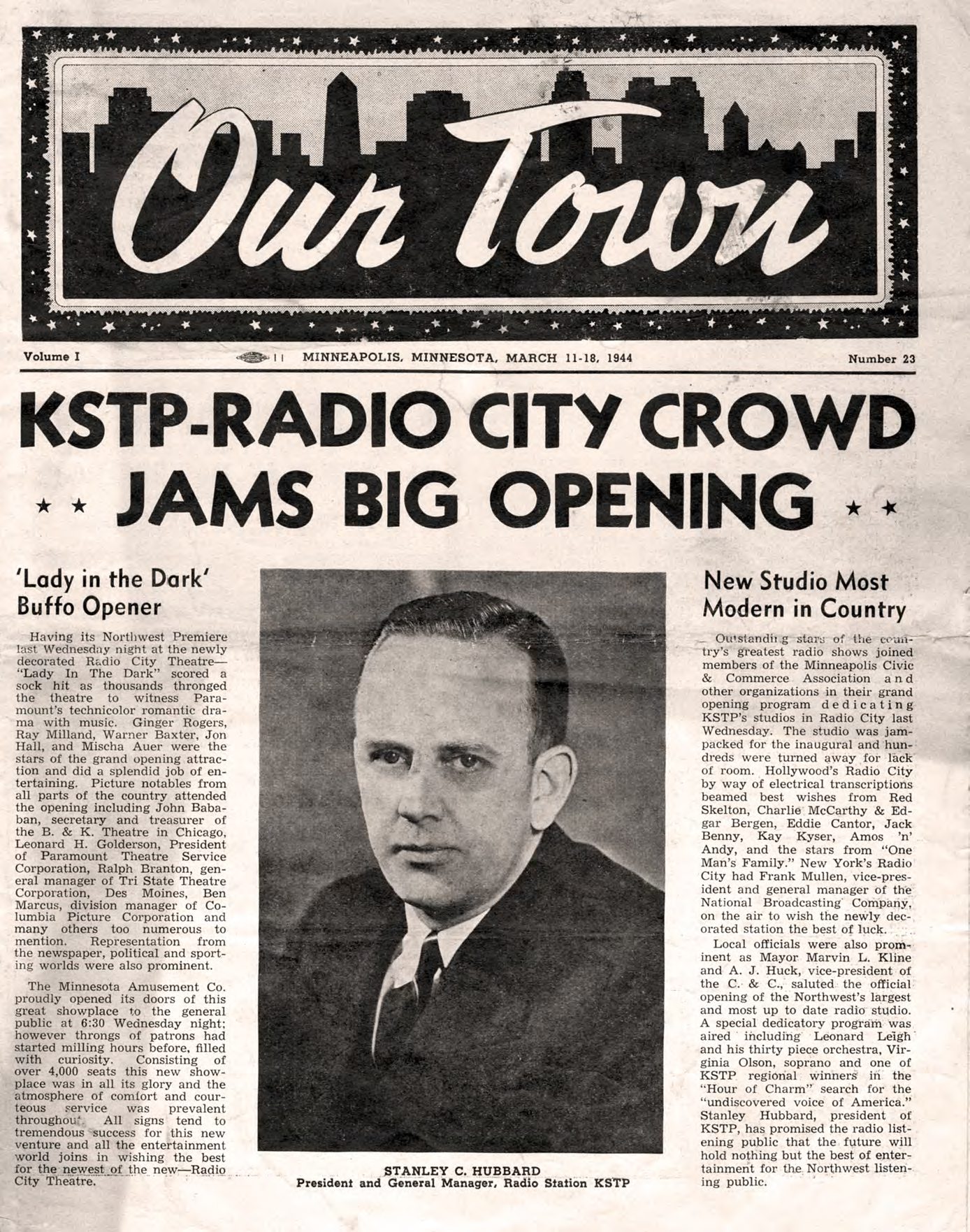 A newspaper with an old photo of a man