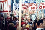 A crowd of people protesting with signs.