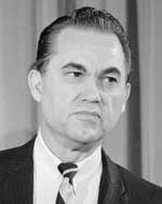 A black and white photo of an older man.